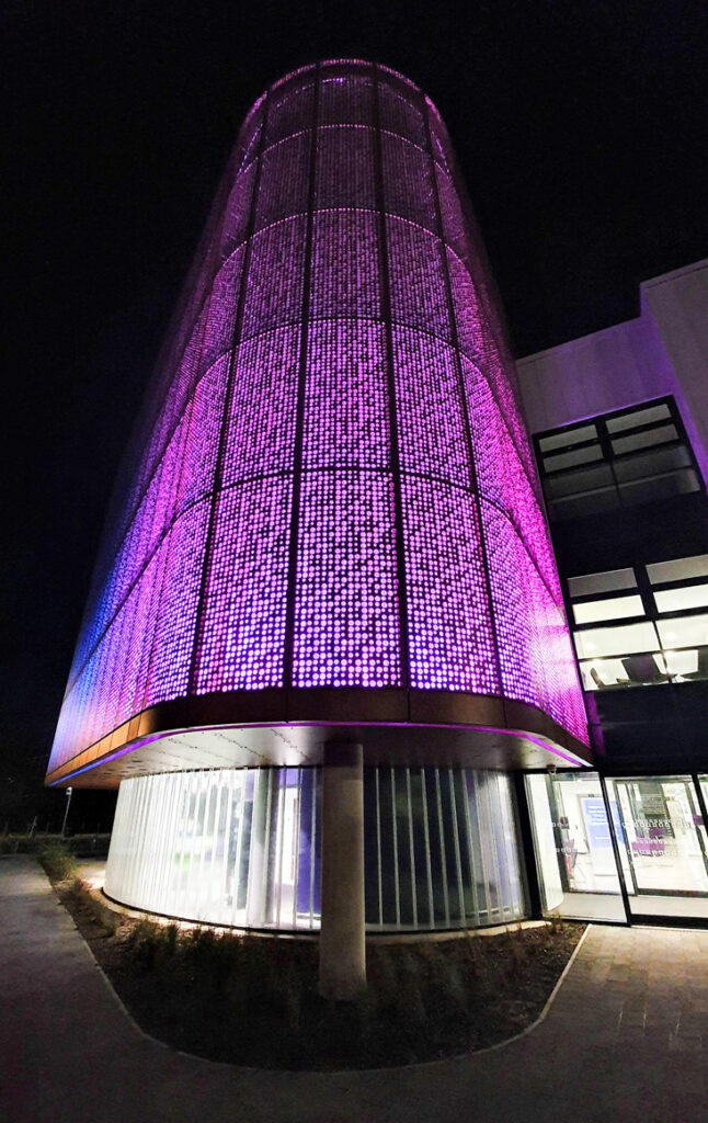 Innovative exterior lighting design from Michael Grubb Studio that enhances Hi Tech & Digital Centre, a hub supporting the region's hi-tech and creative sectors.