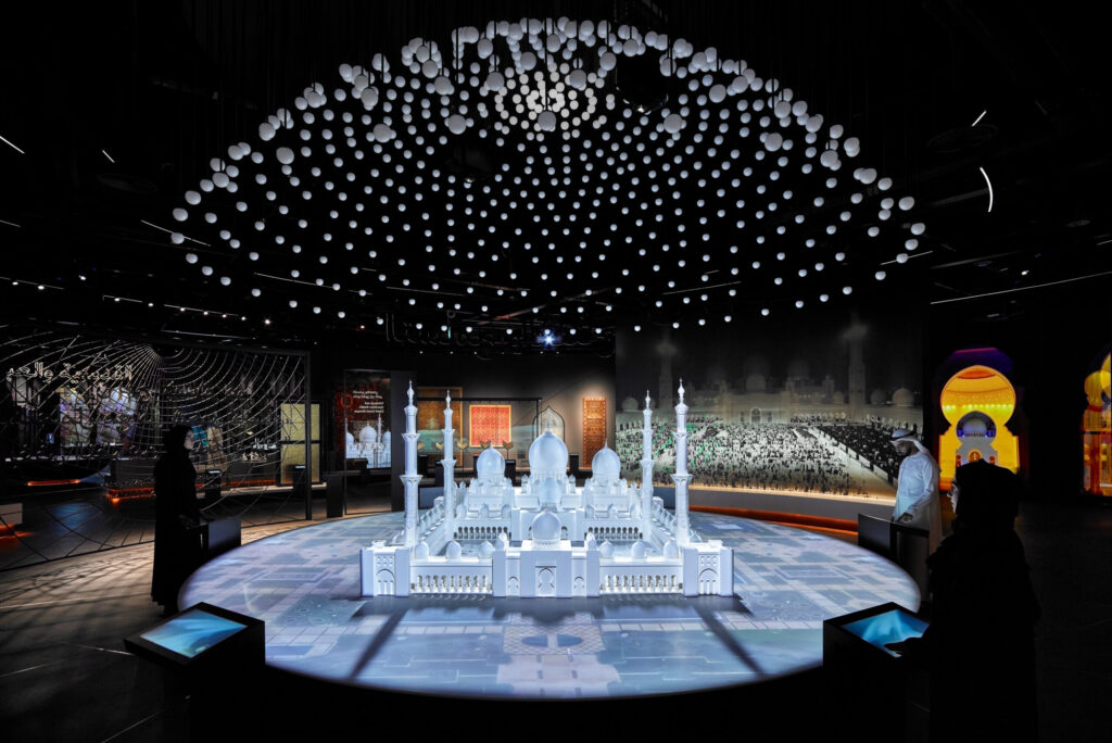 An immersive lighting design enhances the Light & Peace Visitor Experience, using brightness, shadow, and colour to guide visitors through themes of faith, coexistence, and shared humanity.