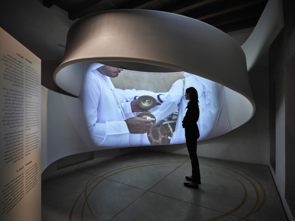 Narrative-led lighting guiding visitors through Emirati heritage themes