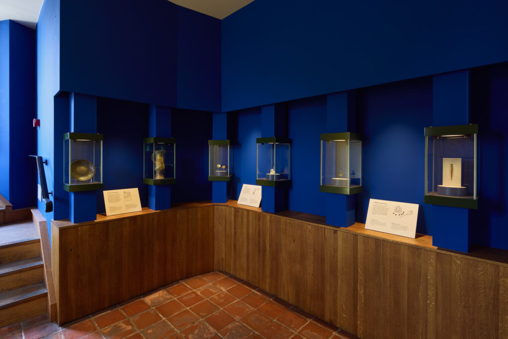 Heritage exhibition lighting design in a medieval palace, creating a visitor experience lighting scheme that unites authenticity and technology