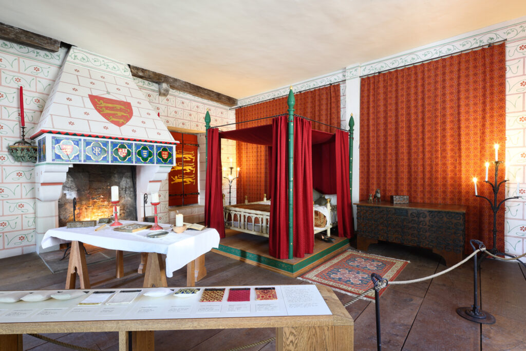 Subtle theatrical lighting enhancing storytelling in reconstructed medieval palace rooms