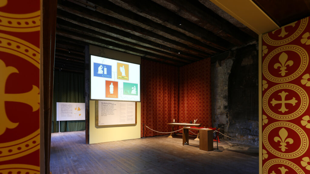 LED and projector lighting highlighting architectural features in medieval royal chambers